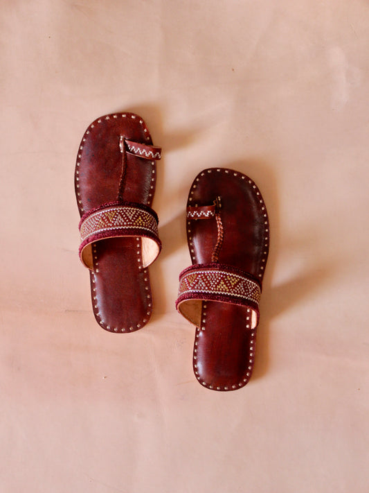ari handstitched leather flats showcasing traditional craftsmanship and intricate detailing