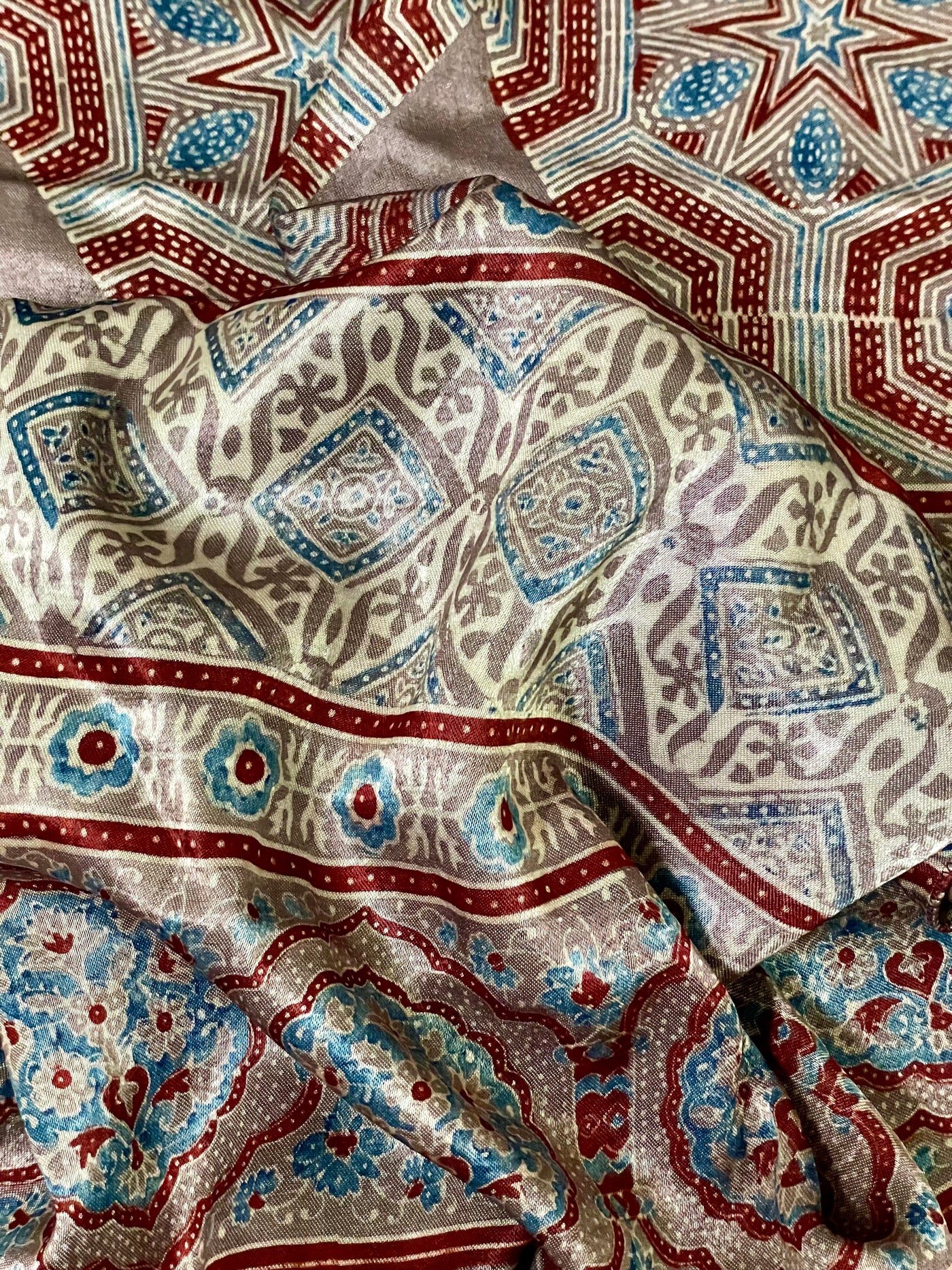Premium bronze Ajrakh stole with heritage block print motifs and luxurious texture