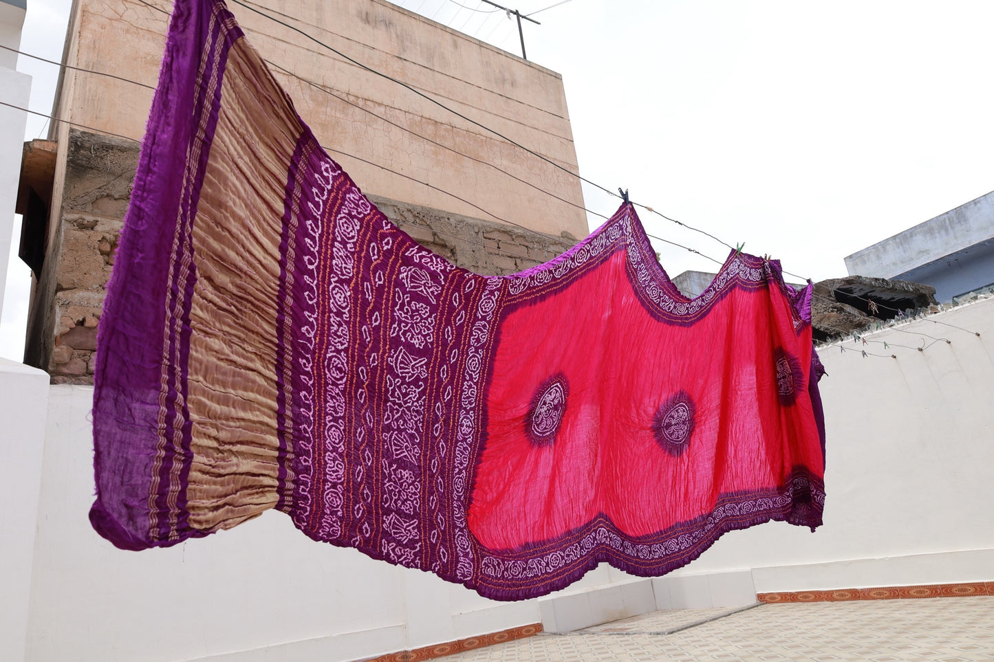Purple Bandhani Gajji silk saree featuring intricate tie-dye patterns and an elegant zari pallu