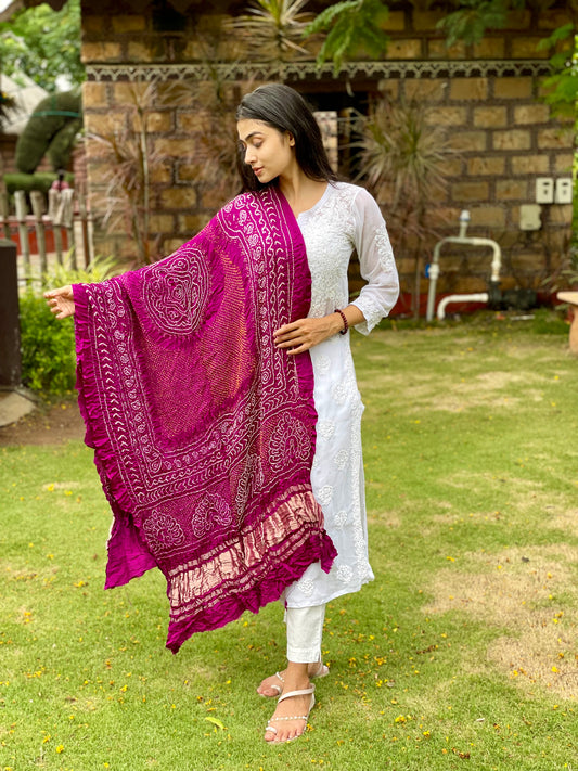 Rani pink Bandhani Gajji silk dupatta featuring traditional tie-dye craftsmanship and graceful drape