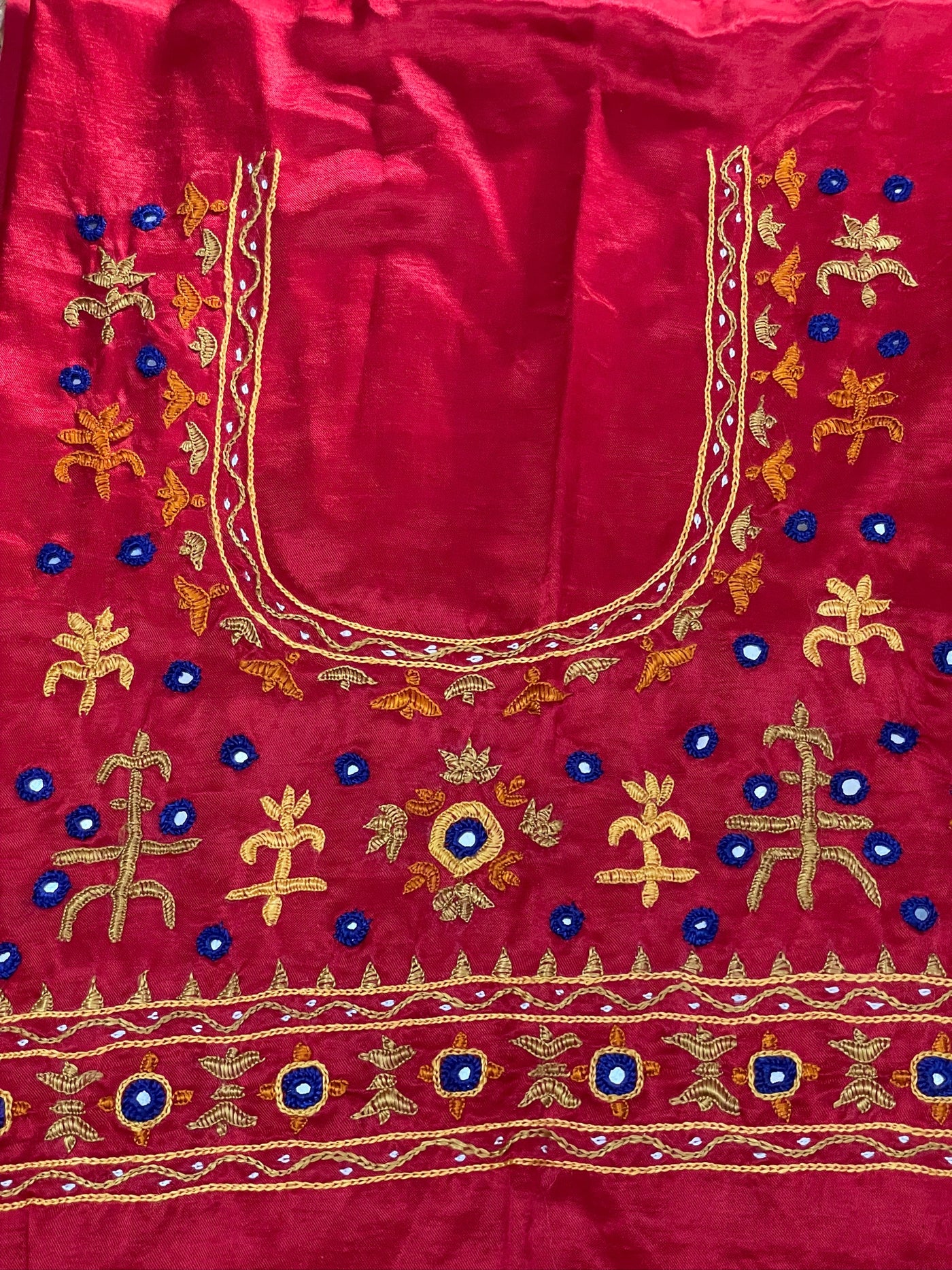 Raspberry pink Pakko embroidery blouse piece showcasing intricate handcrafted embroidery details