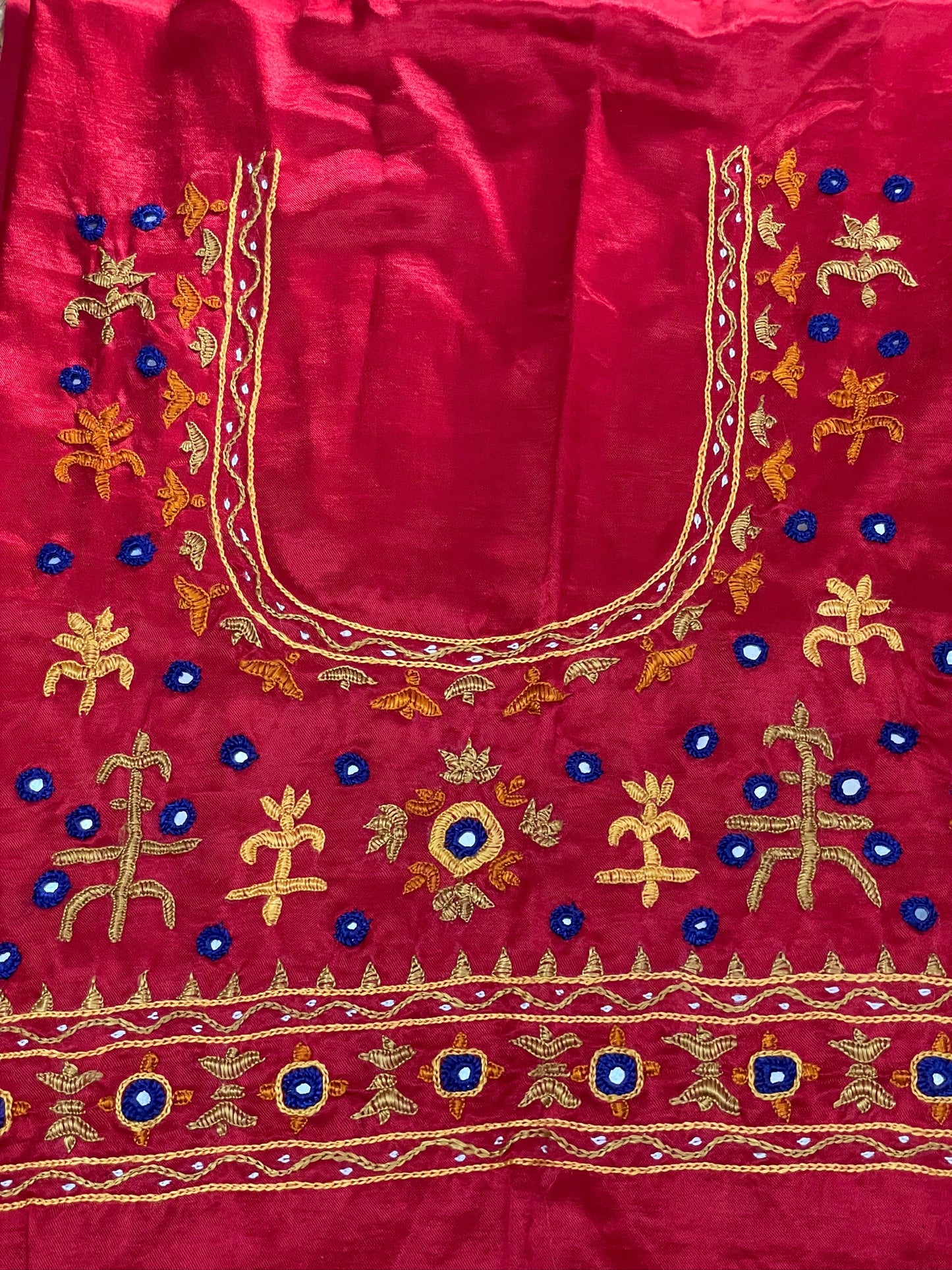 Raspberry pink Pakko embroidery blouse piece showcasing intricate handcrafted embroidery details