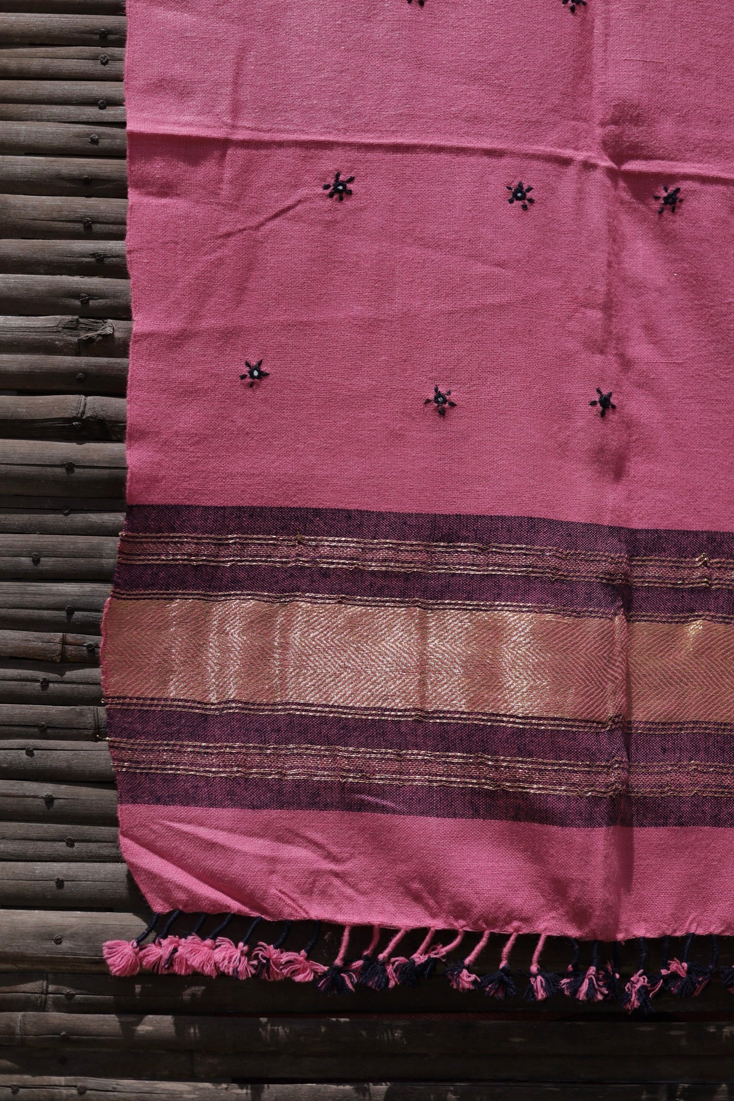 Rose blush handwoven woolen stole featuring a soft pink hue and fine artisan craftsmanship