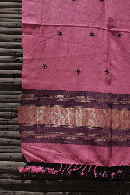 Rose blush handwoven woolen stole featuring a soft pink hue and fine artisan craftsmanship