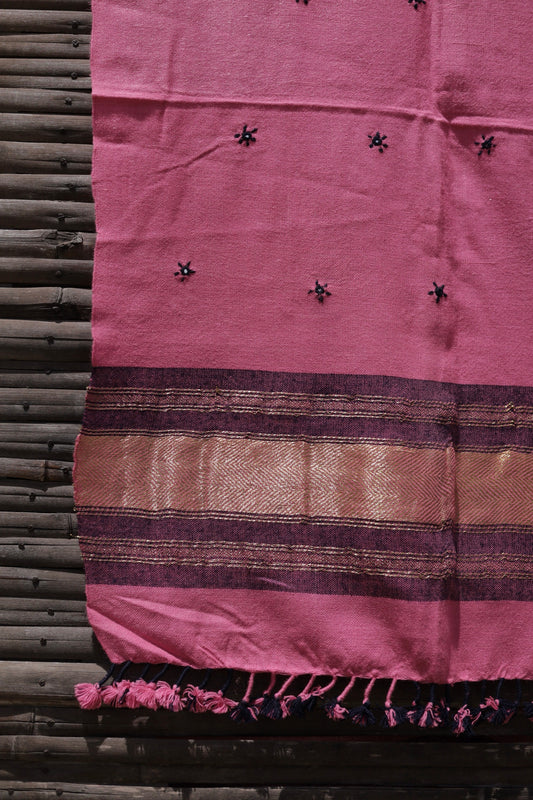 Rose blush handwoven woolen stole featuring a soft pink hue and fine artisan craftsmanship