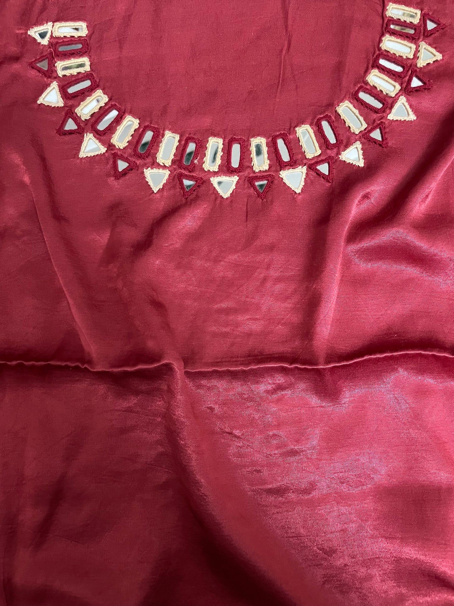 Rose pink mirror work blouse piece showcasing intricate handcrafted embellishments
