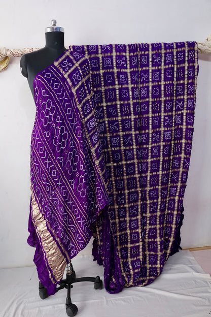 Royal Bandhani Gharchola Gajji silk saree featuring traditional tie-dye motifs and heritage-inspired checked patterns