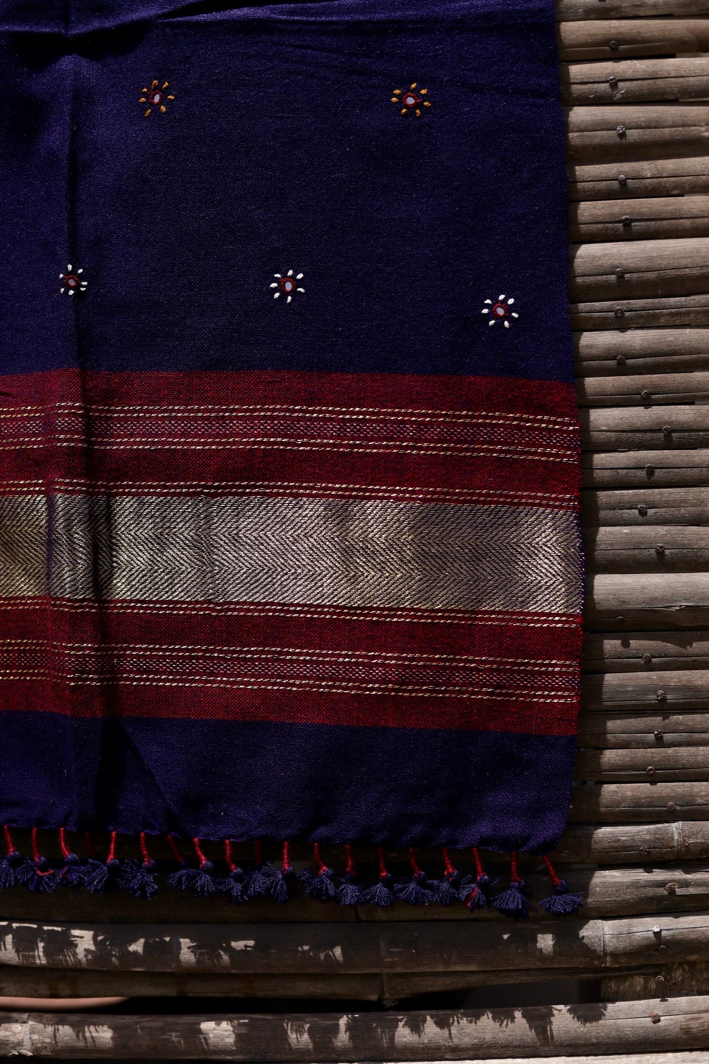 Royal indigo handwoven woolen stole featuring a rich hue and exceptional artisan craftsmanship