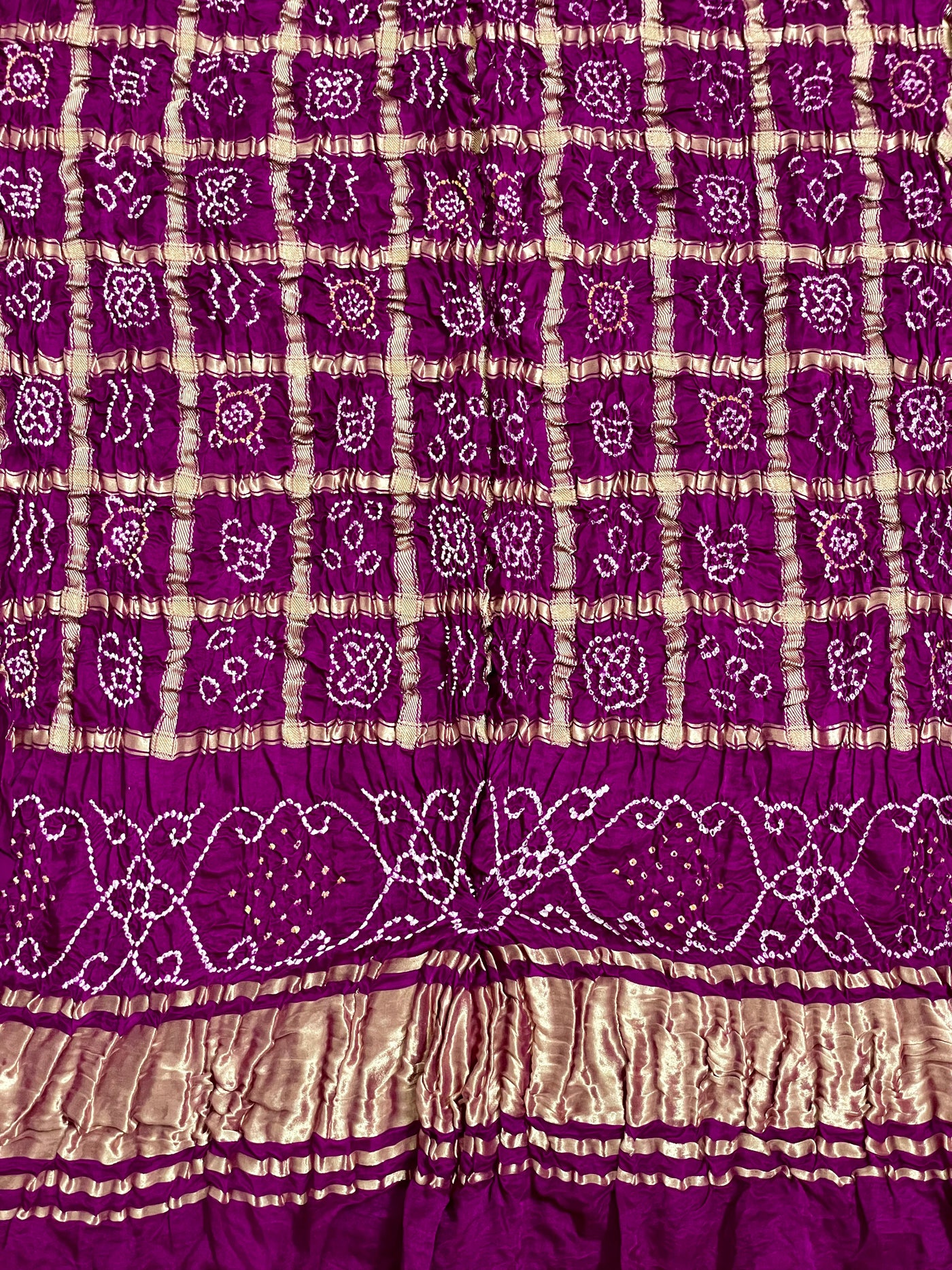 Handcrafted royal purple Gharchola dupatta featuring authentic Bandhani patterns and zari detailing