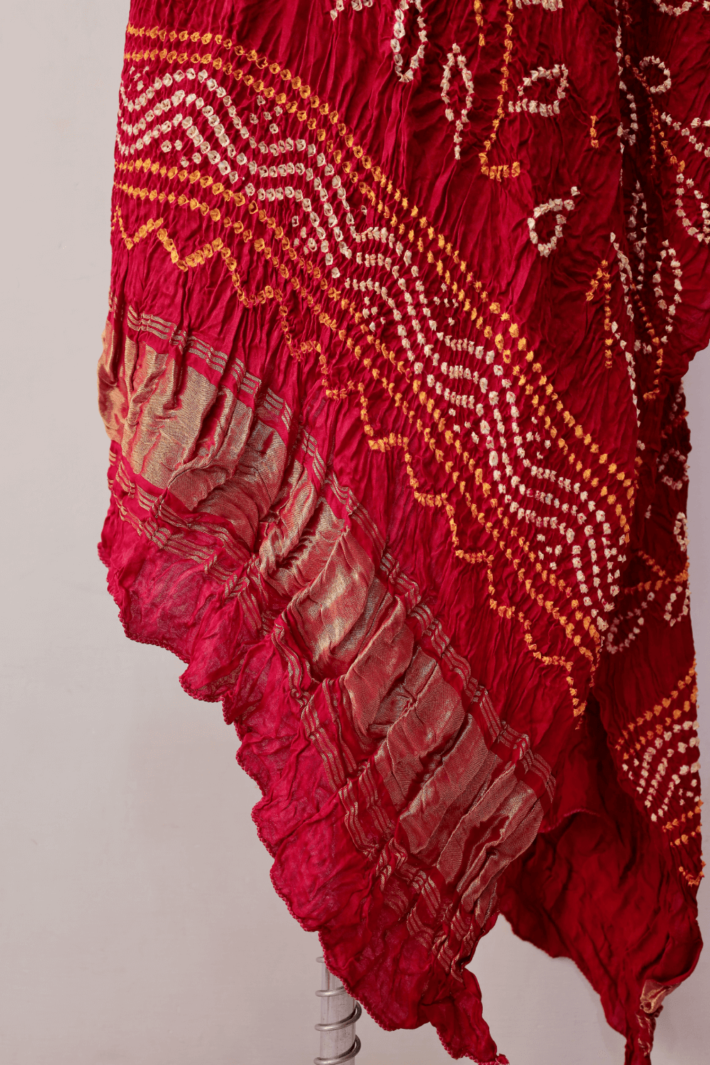 Lightweight ruby red Bandhani modal silk dupatta with soft texture and graceful flow