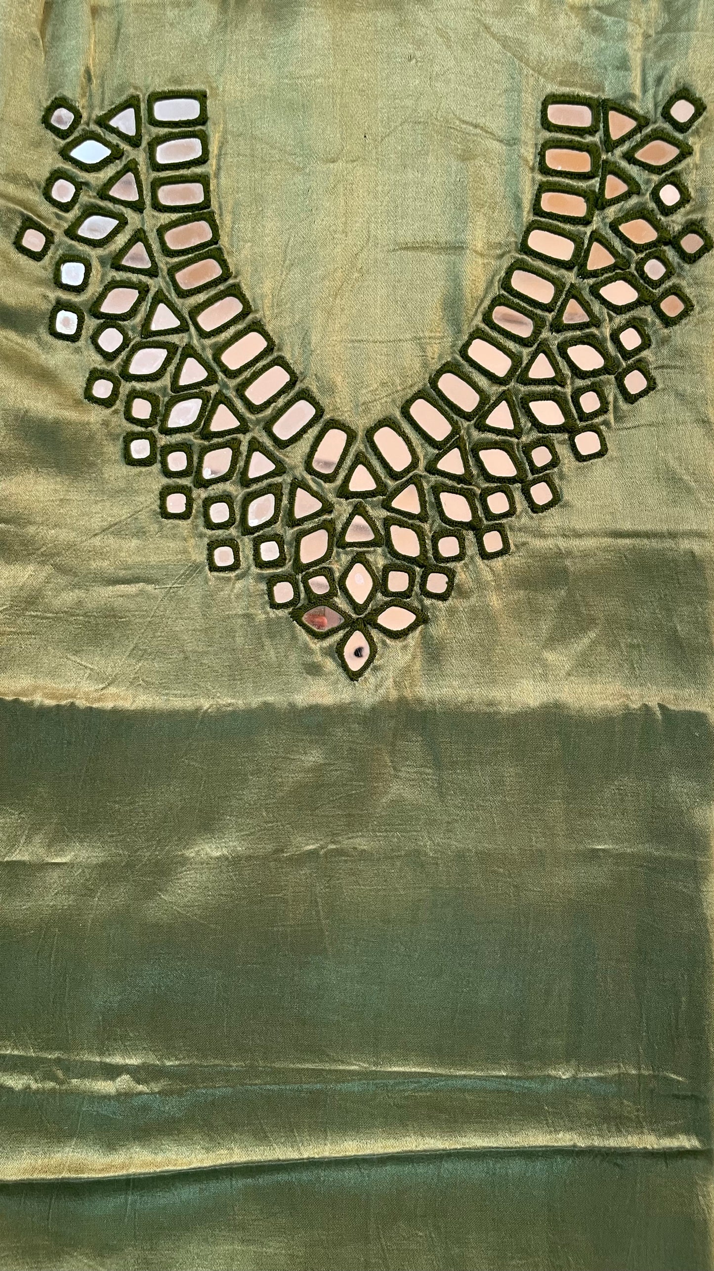 Sage green mirror work dress material showcasing intricate handcrafted embellishments