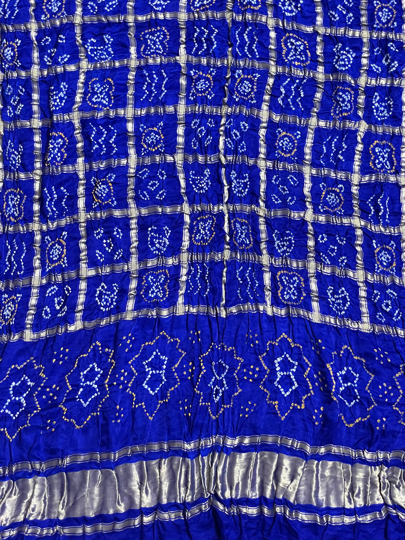 Sapphire blue Bandhani Gharchola dupatta with intricate zari work and traditional craftsmanship