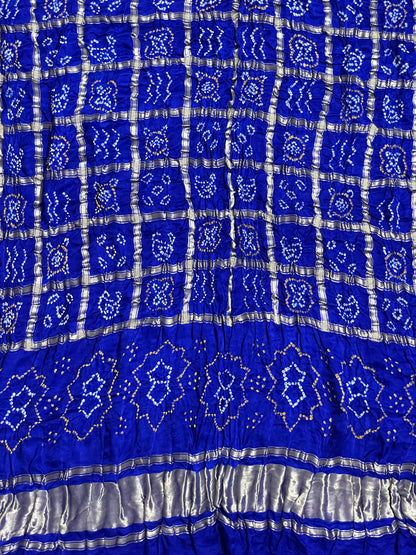 Sapphire blue Bandhani Gharchola dupatta with intricate zari work and traditional craftsmanship