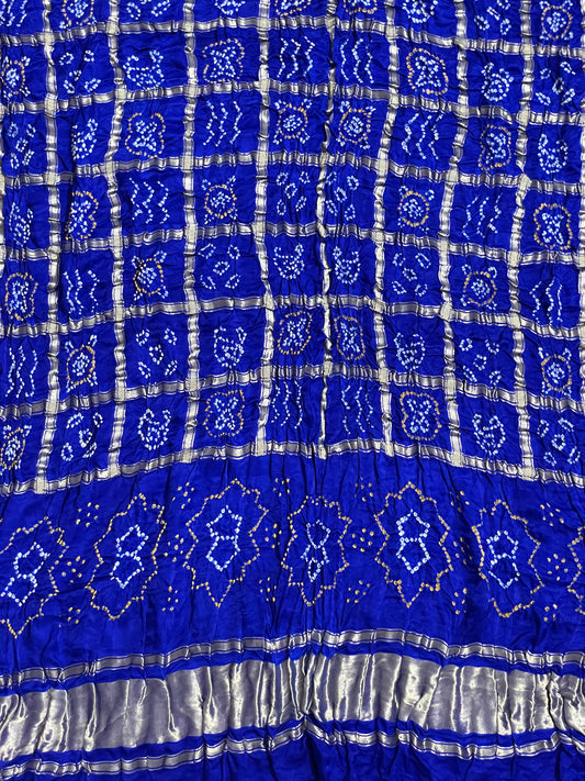 Sapphire blue Bandhani Gharchola dupatta with intricate zari work and traditional craftsmanship