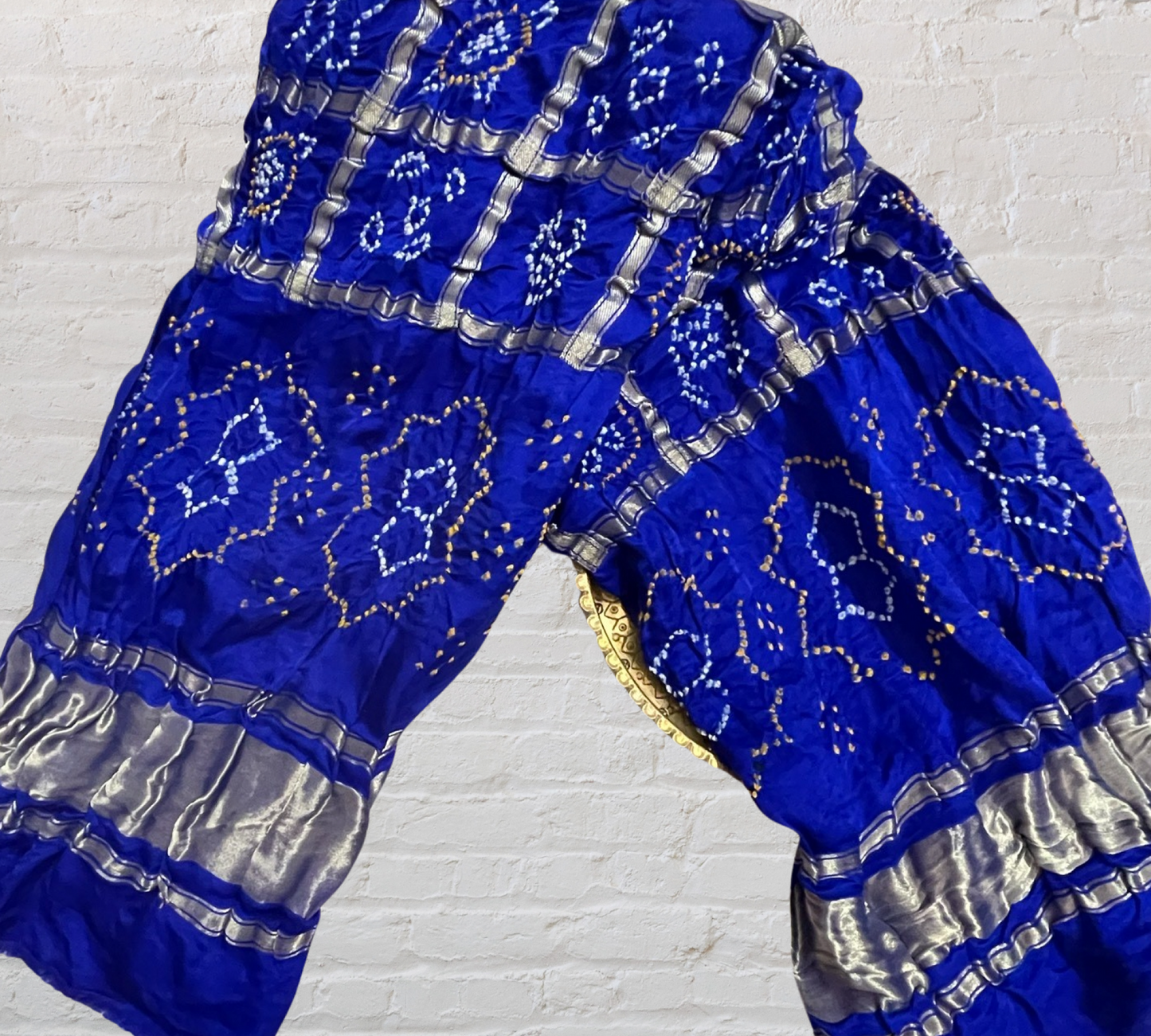 Handcrafted sapphire blue Gharchola dupatta featuring authentic Bandhani patterns and zari detailing