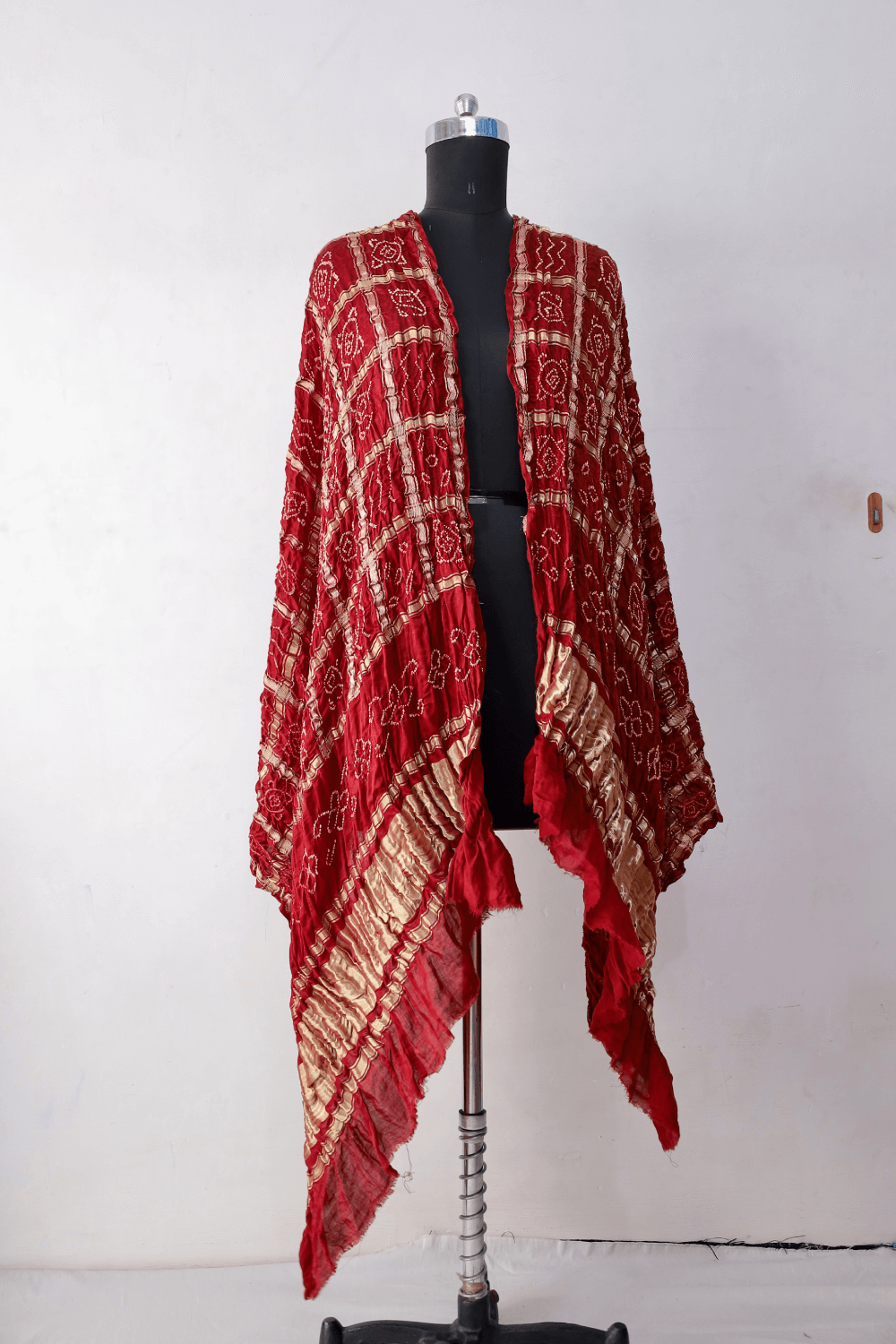 Scarlet red Bandhani Gharchola dupatta featuring traditional tie-dye craftsmanship and classic Gharchola patterns