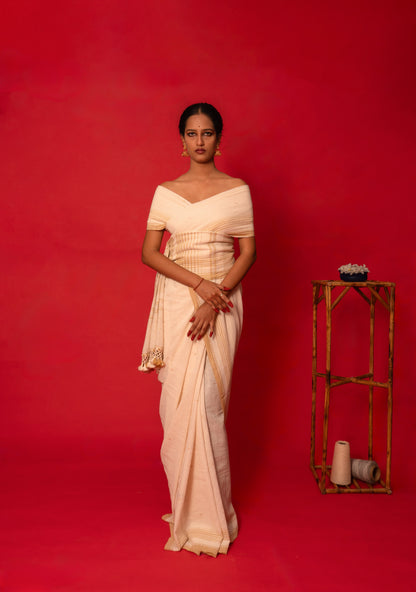 Shell Kala Cotton Bhujodi saree featuring traditional handwoven patterns and artisanal craftsmanship