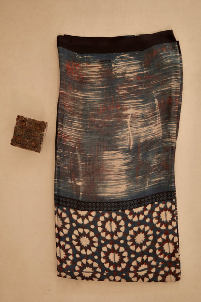 Smoky Ajrakh modal silk dupatta featuring intricate hand block printed motifs and elegant drape