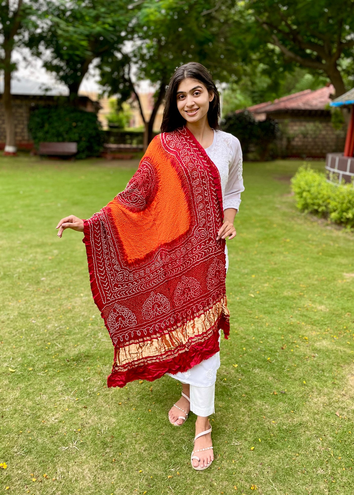 Handcrafted Bandhani Gajji silk dupatta in vibrant tangerine and red shades