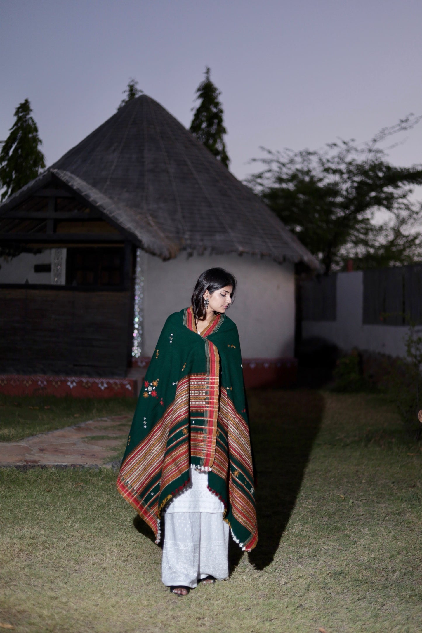 Teal handwoven woolen shawl featuring a rich texture and exceptional artisan craftsmanship