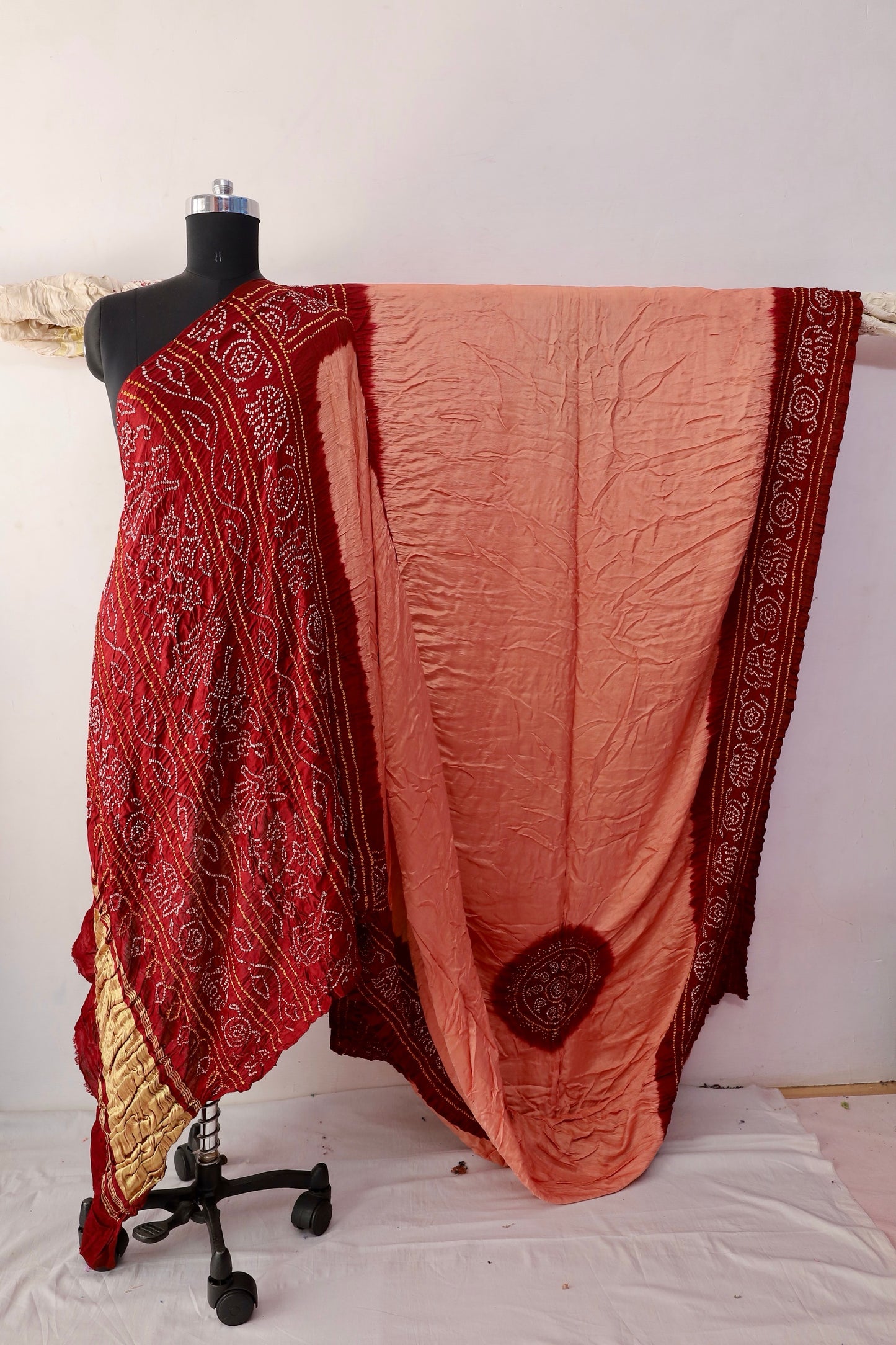Terracotta Bandhani Gajji silk saree featuring intricate tie-dye patterns and an elegant zari pallu
