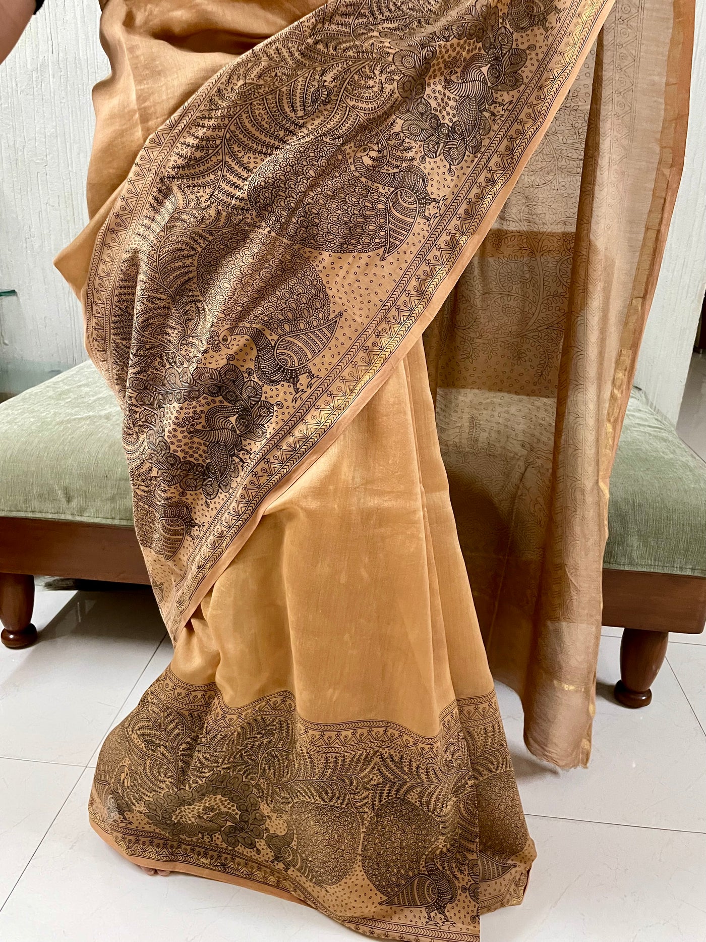 Handcrafted ancient gold Mata Ni Pachedi saree adorned with authentic handpainted designs inspired by Gujarat's folk art heritage