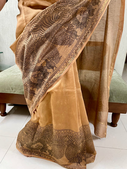 Handcrafted ancient gold Mata Ni Pachedi saree adorned with authentic handpainted designs inspired by Gujarat's folk art heritage