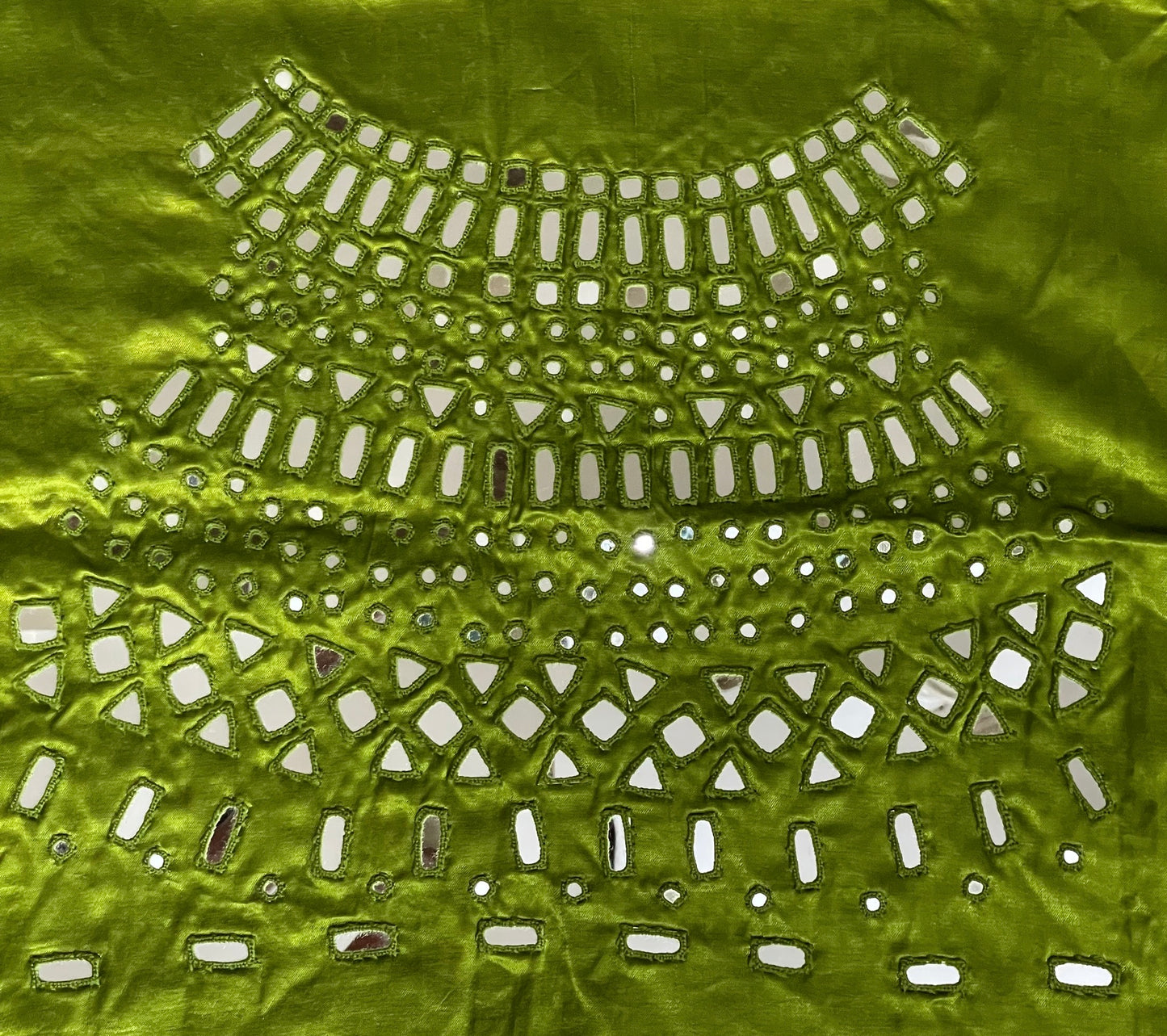 Apple green mirror work blouse piece showcasing intricate handcrafted embellishments