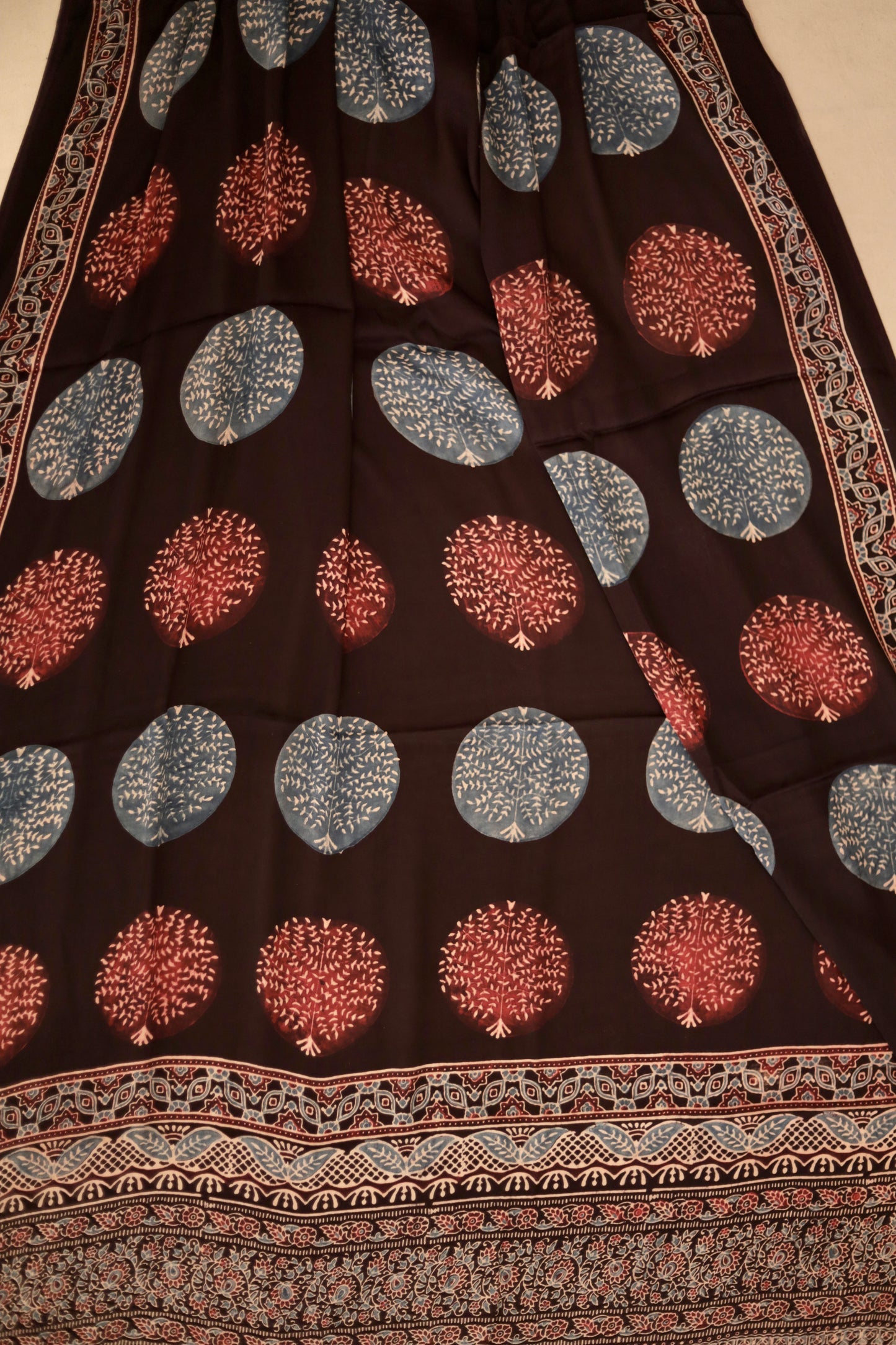 Traditional black Ajrakh modal silk dupatta showcasing authentic artisan craftsmanship