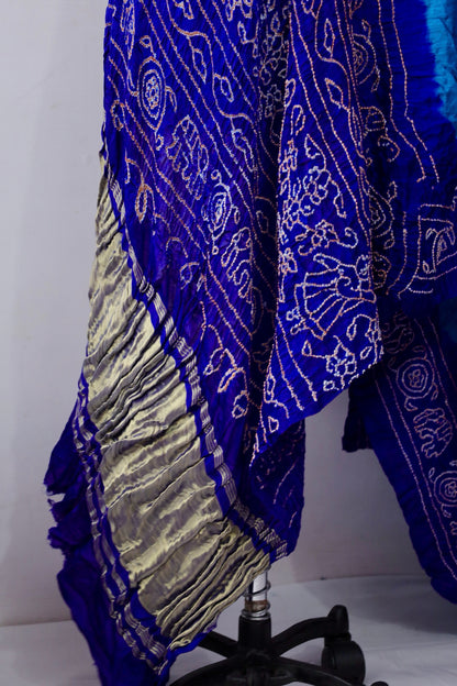 Premium cobalt Bandhani Gajji silk saree highlighting fine artisan craftsmanship and festive elegance