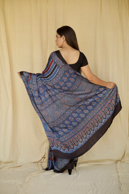 Premium cobalt blue modal silk saree with heritage-inspired Ajrakh designs and fluid texture