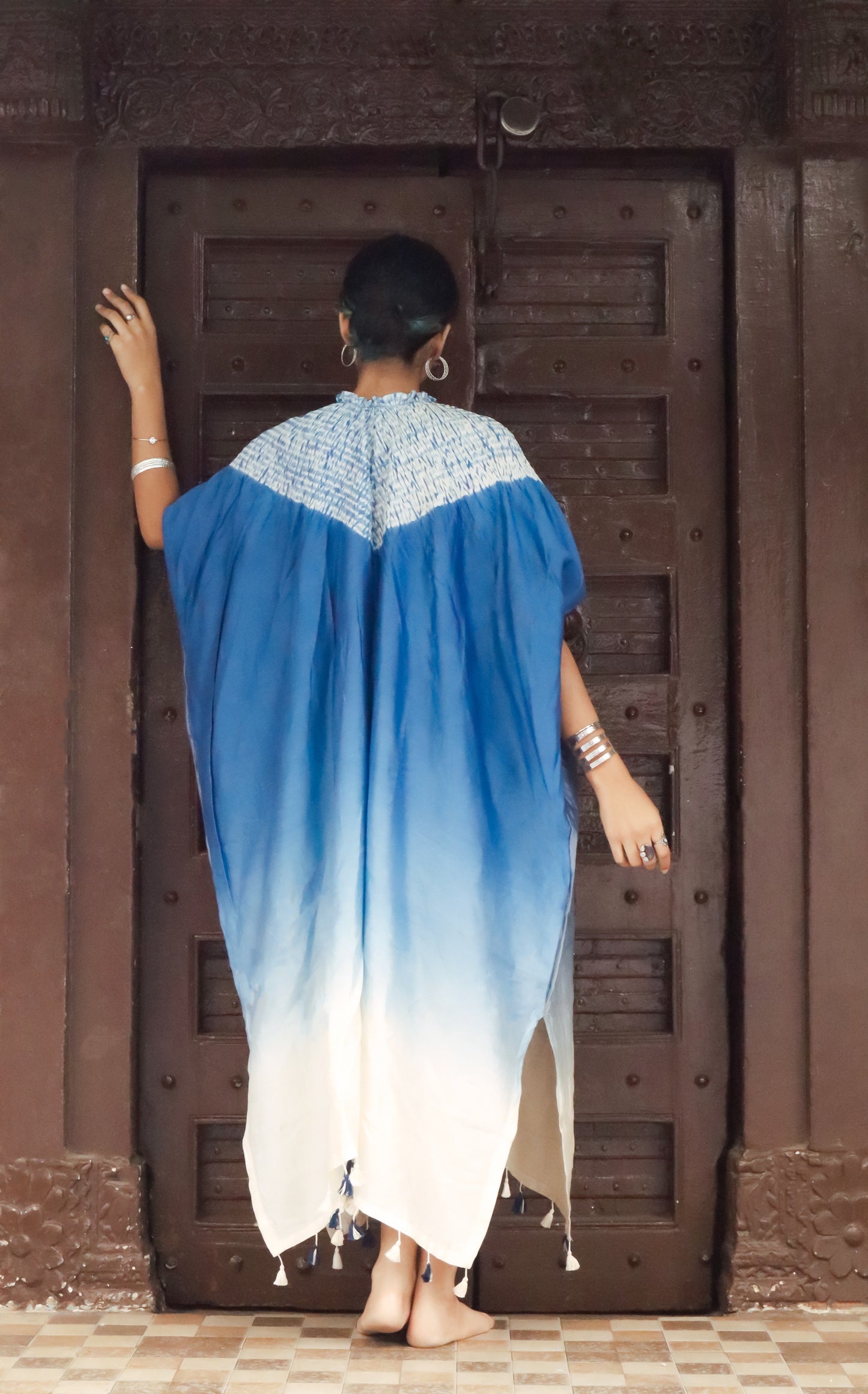 Handcrafted cobalt resolve silk kaftan featuring traditional Bandhani and Shibori textile artistry