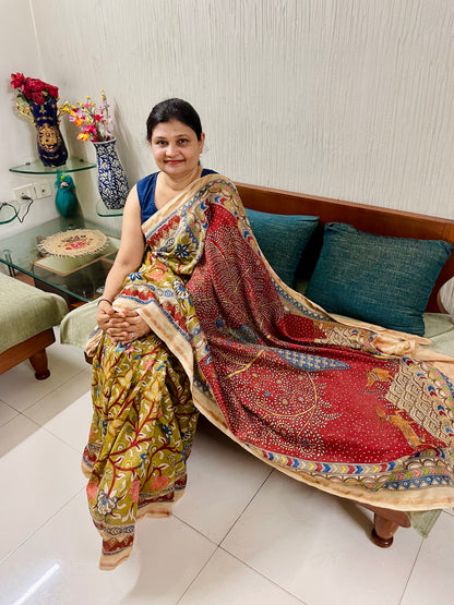 Handcrafted crimson Mata Ni Pachedi saree adorned with authentic handpainted designs inspired by Gujarat's folk art heritage