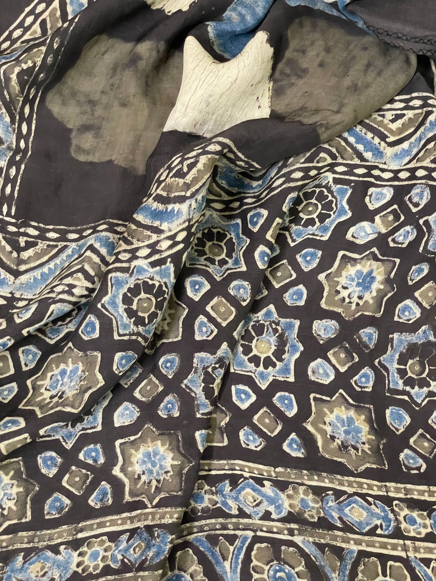 Ethnic dark olive green modal silk stole adorned with detailed Ajrakh-inspired patterns