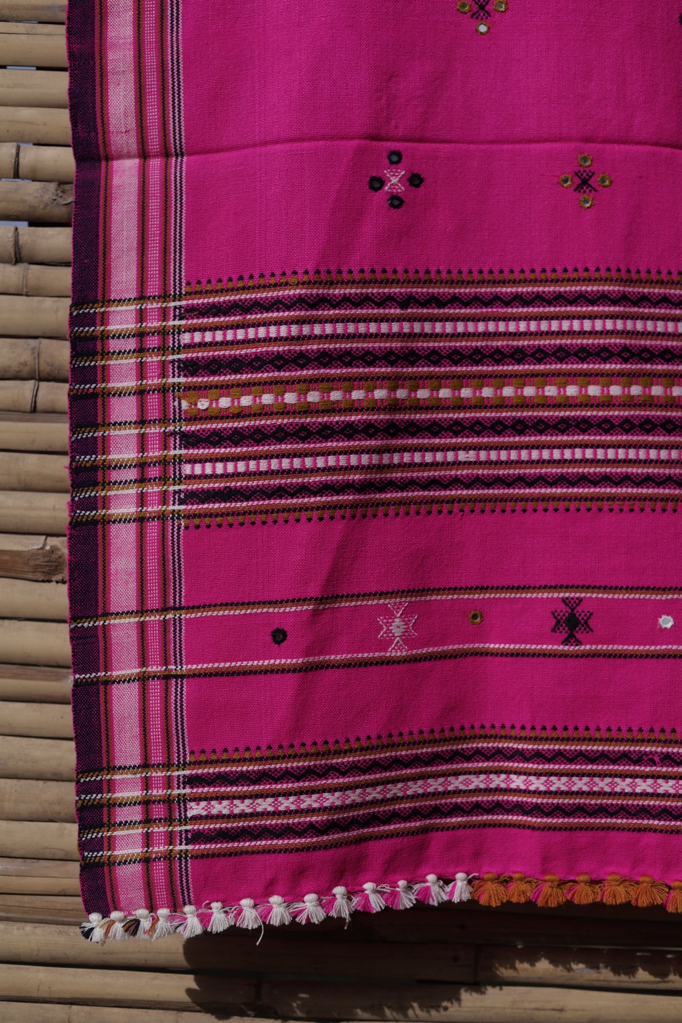 Premium handwoven woolen shawl in fuchsia pink with a soft texture and graceful drape