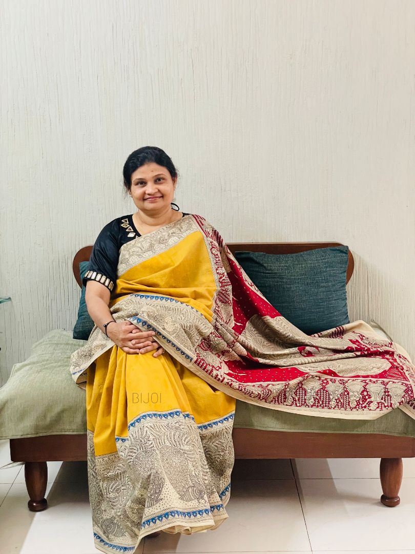 Handcrafted golden beige Mata Ni Pachedi saree adorned with authentic handpainted designs inspired by Gujarat's folk art heritage