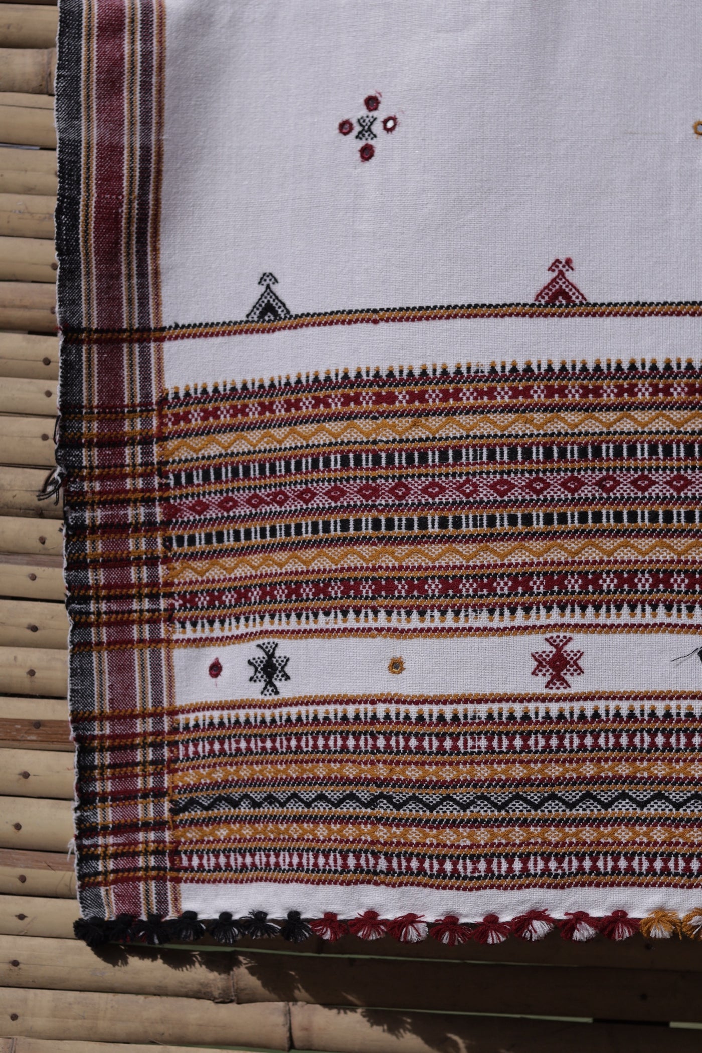 Traditional ivory white wool shawl showcasing authentic weaving artistry and timeless elegance