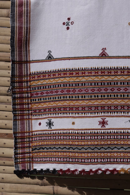 Traditional ivory white wool shawl showcasing authentic weaving artistry and timeless elegance