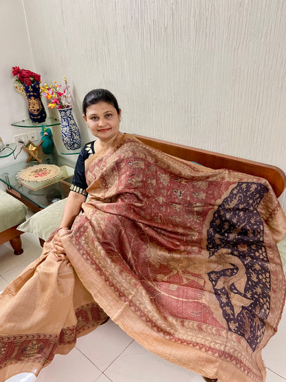 Handcrafted mauve Mata Ni Pachedi saree adorned with authentic handpainted designs inspired by Gujarat's folk art heritage
