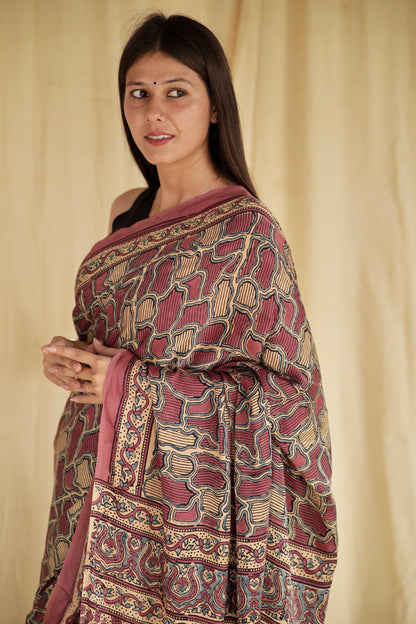 Premium mauve pink modal silk saree with heritage-inspired Ajrakh designs and fluid fall
