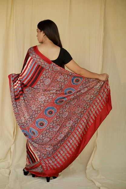 Premium multicolor striped modal silk saree with heritage-inspired Ajrakh designs and fluid texture