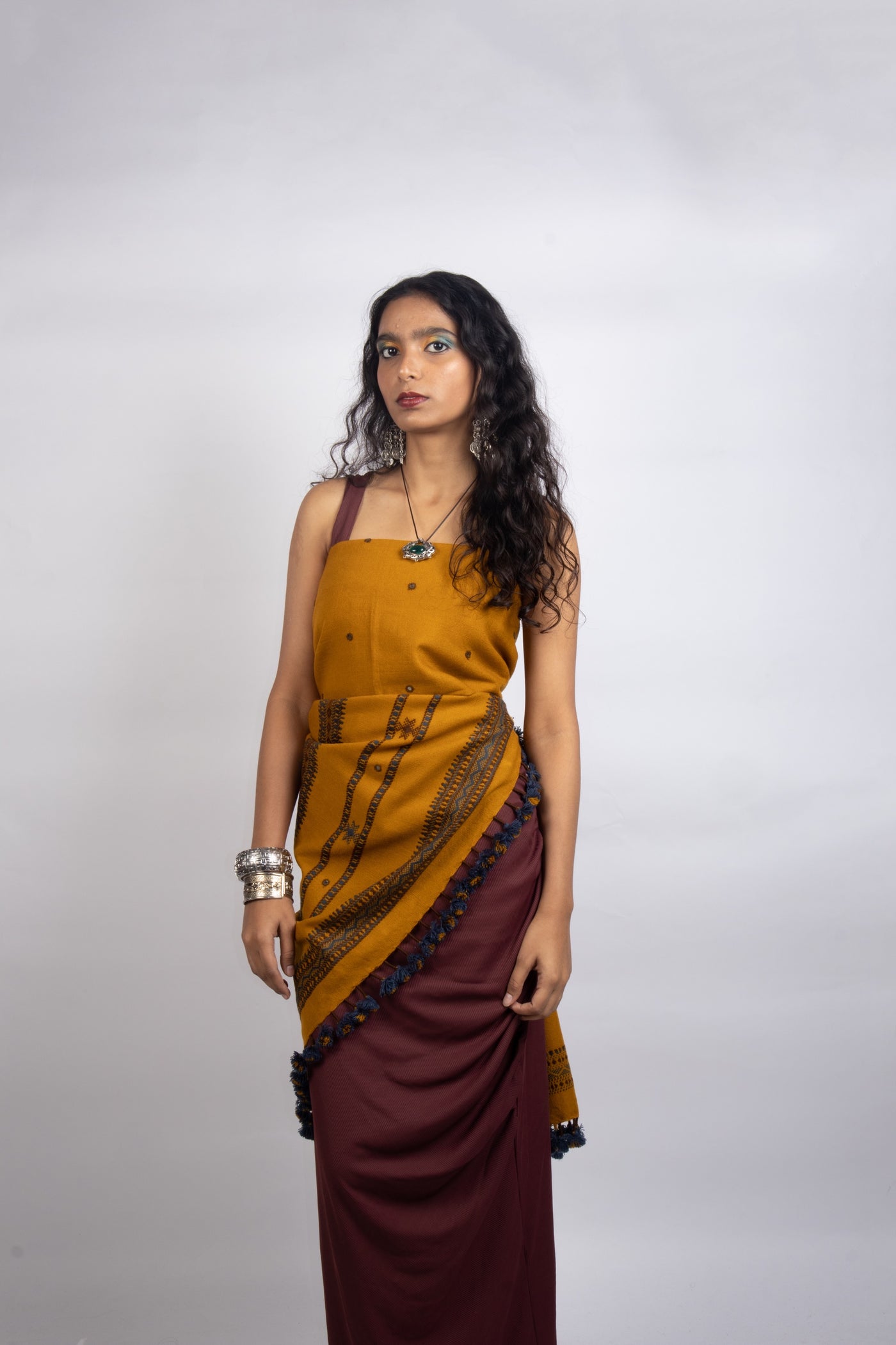 Premium handwoven woolen shawl in mustard with a soft texture and graceful drape