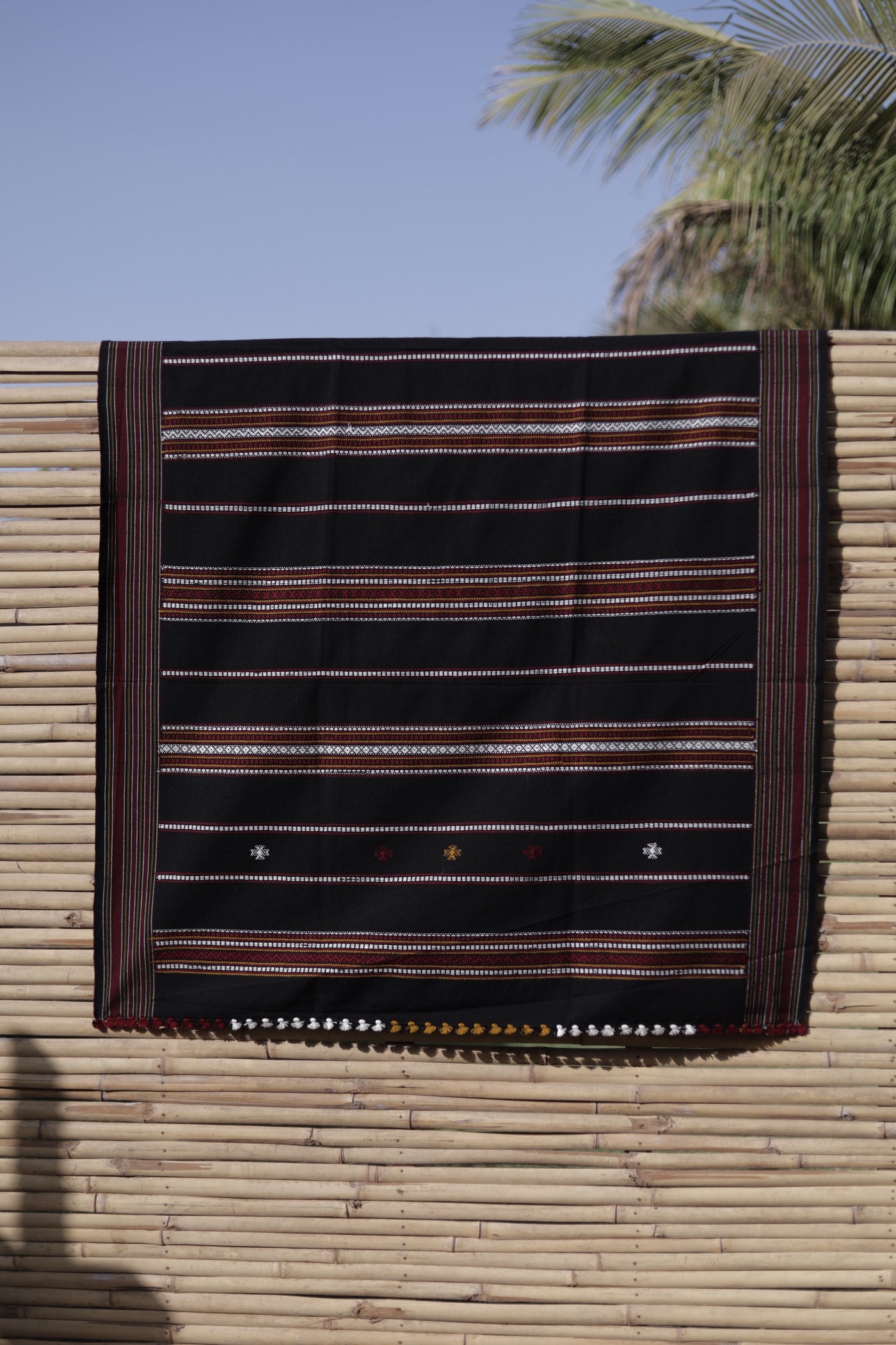 Elegant onyx black wool shawl handcrafted using traditional handloom weaving techniques