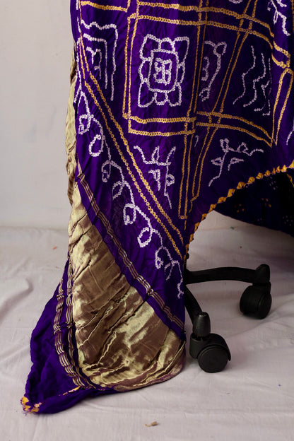 Handcrafted orchid Gajji silk saree showcasing authentic Bandhani artistry with rich zari detailing