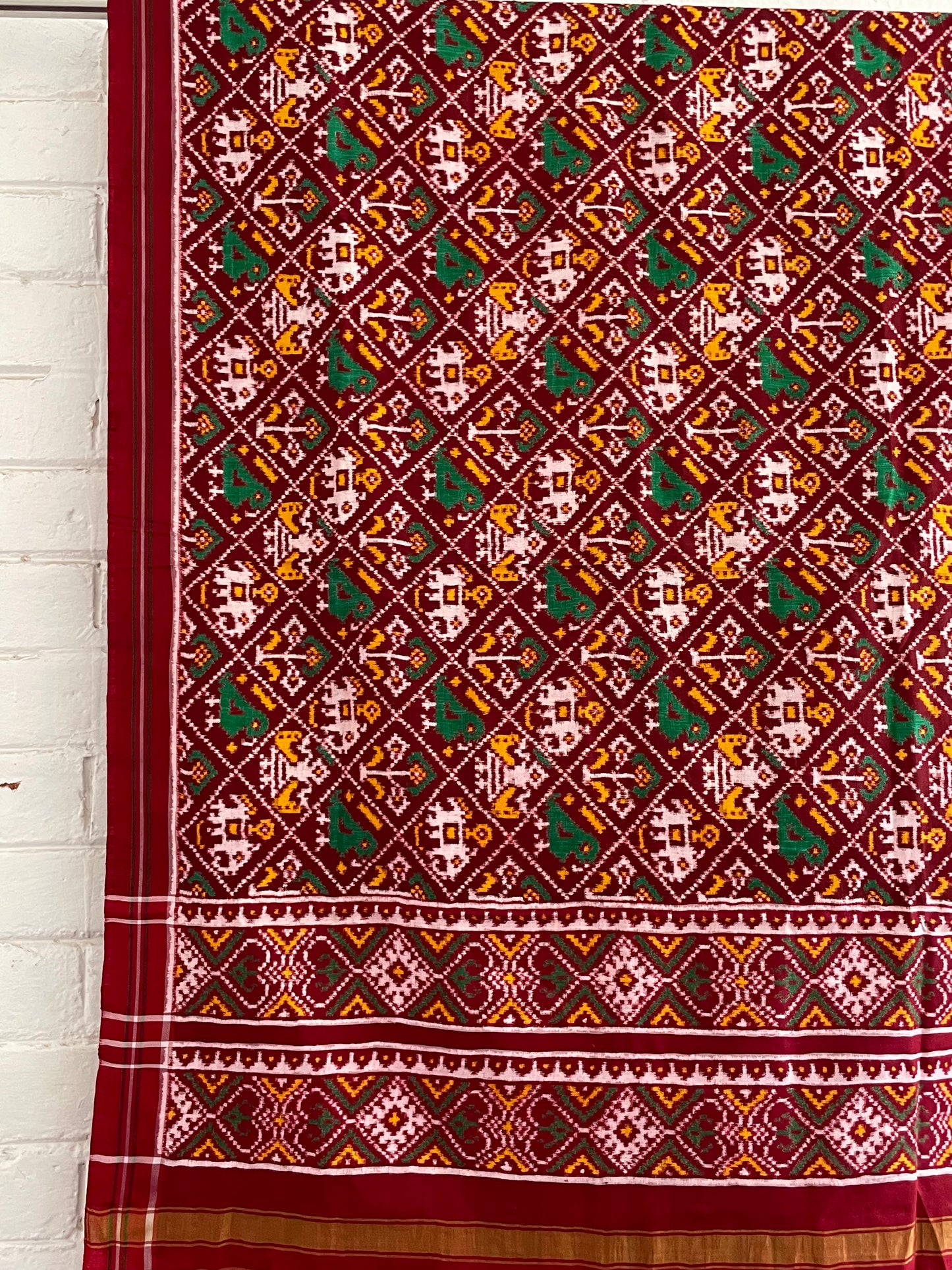 Handcrafted Patola silk dupatta showcasing authentic Double Ikat weaving artistry