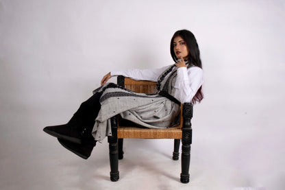 Traditional pearl grey wool shawl showcasing authentic weaving artistry and timeless sophistication