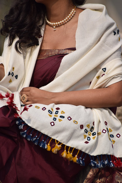 Premium handwoven woolen stole in pearl white with a graceful drape and refined finish