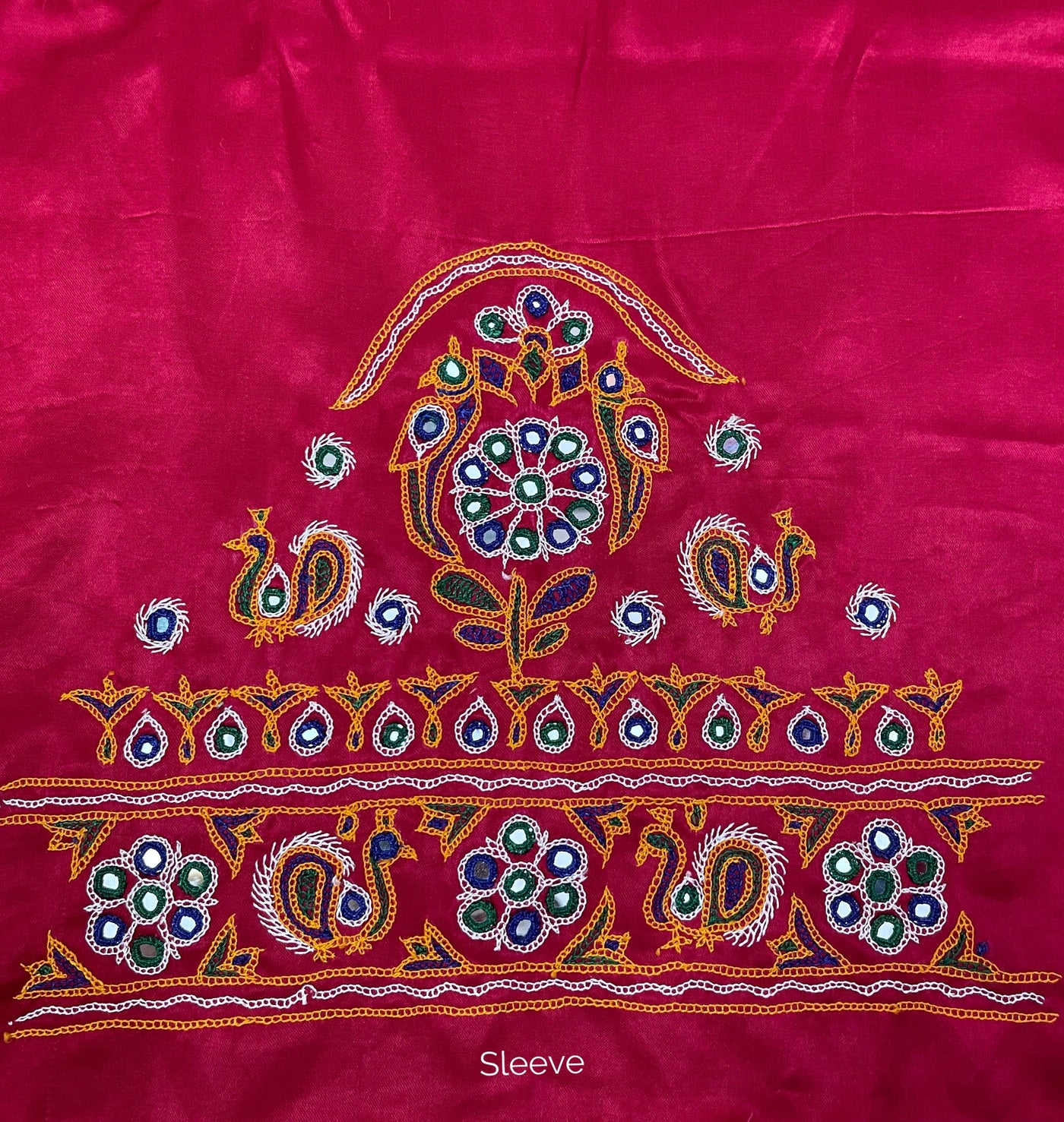 Pink Ahir embroidery blouse piece showcasing intricate handcrafted embroidery details