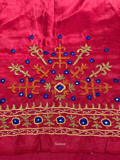 Raspberry pink Pakko embroidery blouse piece showcasing intricate handcrafted embroidery details