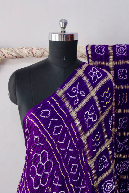Royal Bandhani Gharchola Gajji silk saree featuring traditional tie-dye motifs and heritage-inspired checked patterns